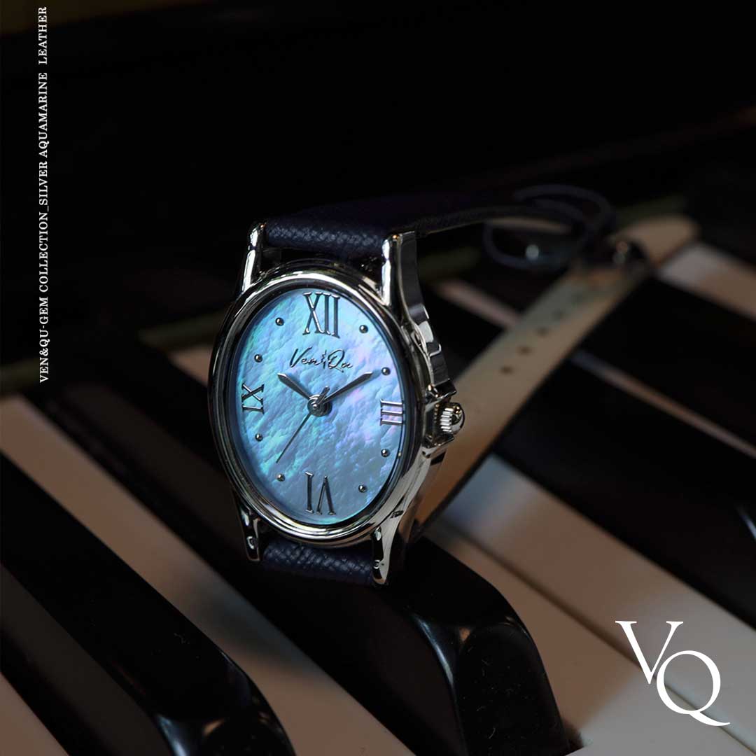 Gem-sølv/akvamarin (Navy Saffiano-skinn)